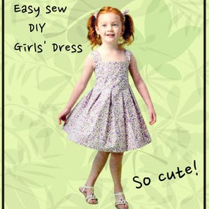 May include: A young girl wearing a floral print dress with a pleated skirt and square neckline. The dress is lavender with small white and purple flowers. The text "Easy sew DIY Girls' Dress" is in the upper left corner, and "So cute!" is in the lower right corner.