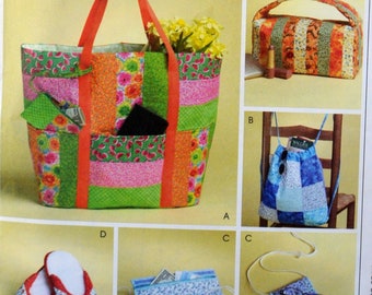 May include: A collection of five different patchwork bags and pouches made from colorful fabric scraps. The bags are designed for carrying everyday items like groceries, books, and personal belongings. The pouches are perfect for storing small items like keys, phones, and wallets. The bags are all made with a patchwork design, using a variety of colors and patterns. The bags are all made with a patchwork design, using a variety of colors and patterns. The bags are all made with a patchwork design, using a variety of colors and patterns. The bags are all made with a patchwork design, using a variety of colors and patterns. The bags are all made with a patchwork design, using a variety of colors and patterns.