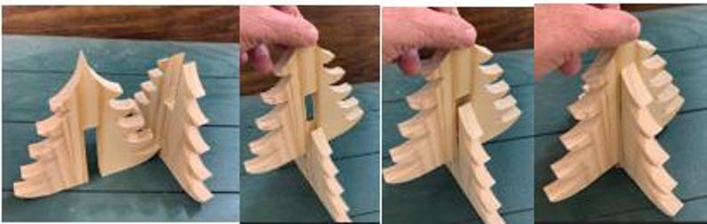 May include: A wooden Christmas tree decoration, shown in four stages of assembly. The tree is made of light-coloured wood and features a slotted design for easy construction. The image shows the pieces being joined together to form the tree.