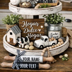 May include: A two-tiered farmhouse-style decorative tray with various miniature items. Includes a cow figurine, a white pickup truck, a sign that says "Hogar Dulce Hogar", and two rolling pins with customizable text.