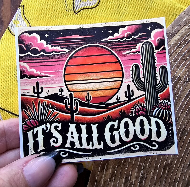 May include: A retro-style illustration of a desert sunset with a cactus and the text "It's All Good". The illustration is in shades of pink, orange, and yellow.