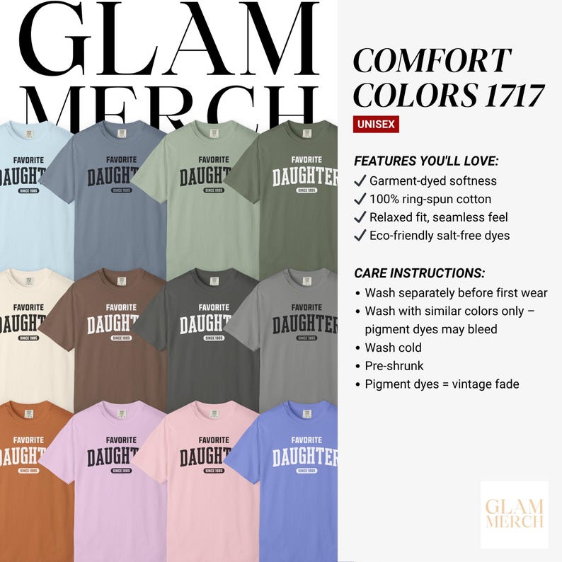 May include: A collection of unisex t-shirts in various colors, each displaying the text "FAVORITE DAUGHTER" in white block letters. The shirts are garment-dyed and made of ring-spun cotton. The brand name "GLAM MERCH" is visible.