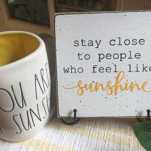Stay close to people who feel like sunshine inspirational gift
