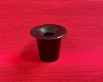 A small Bakelite inkwell made in the 1930s in Latvia at the Plastelit factory.