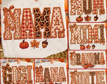 May include: A white t-shirt featuring various family titles like MAMA, MOM, MIMI, GRANDMA, GIGI, NANA, and AUNTIE in block letters. The letters have patterns including red plaid, leopard print, polka dots, and floral designs with orange bows.
