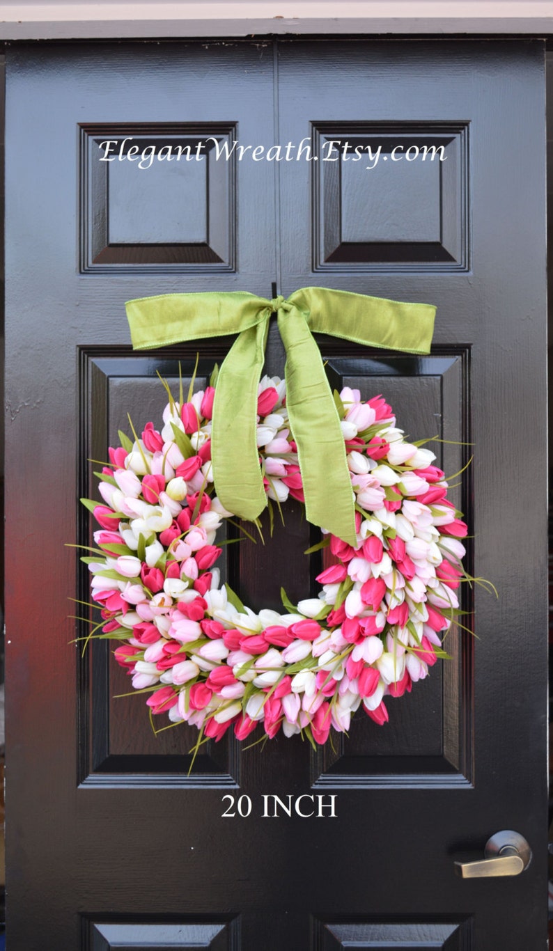 May include: A pink and white tulip wreath with a green bow, hanging on a black door. The wreath is 20 inches in diameter. The text "Elegant Wreath.Etsy.com" is visible on the door.