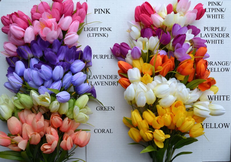 May include: A bouquet of artificial tulips in various colors, including pink, light pink, purple, lavender, green, coral, orange, yellow, and white. The tulips are arranged in a rainbow pattern.