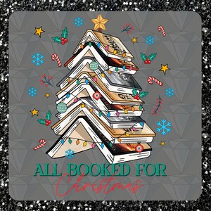 May include: A Christmas tree made of stacked books with lights and decorations. The text "All Booked for Christmas" is at the bottom of the image.