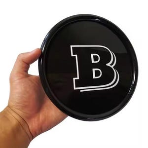 メルセデスベンツ G-ワゴン W463a W464 用プラスチックエンブレム ブラバス フロントグリルバッジ