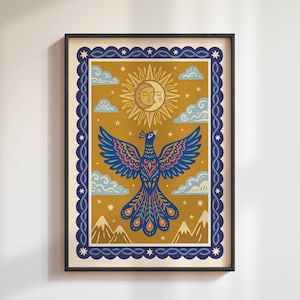 May include: A framed rectangular wall art print featuring a central blue bird with spread wings against a mustard yellow background. Above the bird is a sun and moon face icon, surrounded by clouds, stars, and mountain silhouettes at the bottom.