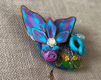 Imán de polvo de hadas de arcilla polimérica con diseño de dragón para sujetar agujas, ideal para punto de cruz y manualidades.
