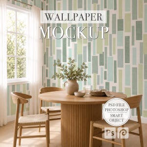 May include: A digital wallpaper mockup featuring a wall with a geometric pattern of vertical rectangles in shades of sage green, mint, and white. A round wooden table with a fluted base, three wooden chairs, and a ceramic vase are in the room.