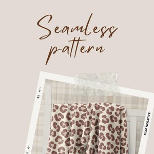 Muted brown leopard print on cream background