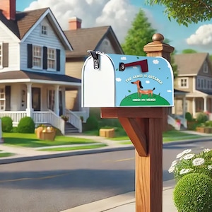 May include: A white mailbox with a blue and green design featuring a cartoon dachshund and the text "The grass is greener under my weiner".