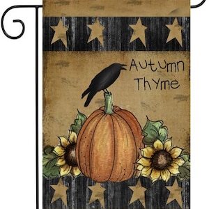 May include: A brown and tan garden flag with a black crow perched on a pumpkin. The flag has a black and white striped background with gold stars and the text "Autumn Thyme".