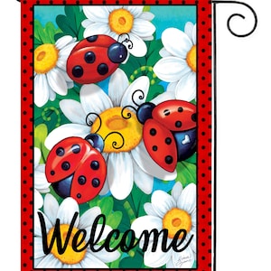 May include: A red and black ladybug garden flag with white daisies and the word "Welcome" in black cursive lettering.