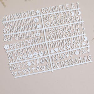 Letras adicionales para tablero de letras de fieltro: 170 letras y símbolos, disponibles en blanco y negro