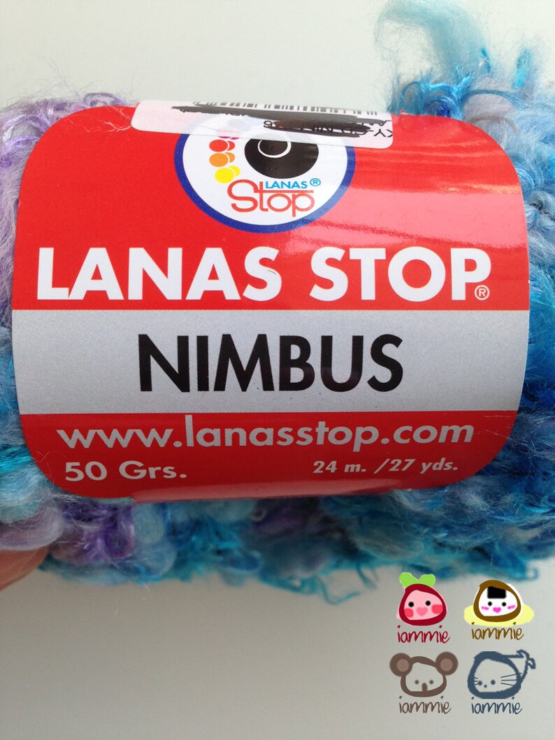 May include: A skein of blue, purple, and white yarn with a label that reads "LANAS STOP NIMBUS" and "www.lanasstop.com". The label also states "50 Grs." and "24 m./27 yds."