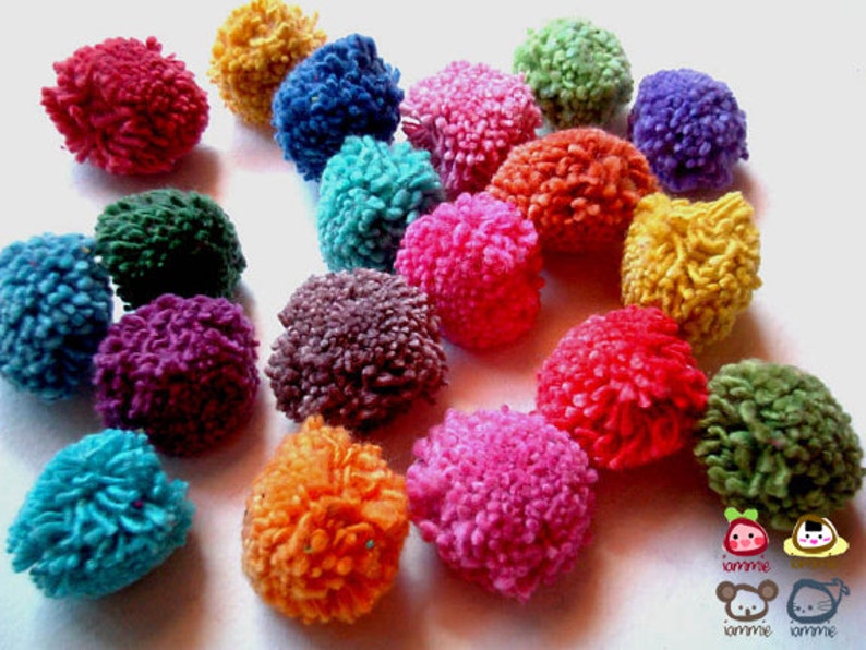 May include: A collection of colorful pom-poms in various shades of blue, green, red, pink, purple, orange, and yellow. The pom-poms are made of yarn and are soft and fluffy.