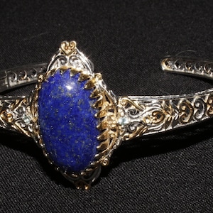 Sterling Silver Lapis Lazuli Clamper Bangle: Gold & Platinum Overlay, Topaz Accents