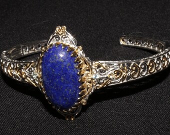 Sterling Silver Lapis Lazuli Clamper Bangle: Gold & Platinum Overlay, Topaz Accents