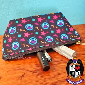 Black and neon retro eyes and abstract print zippered pouch with flat bottom