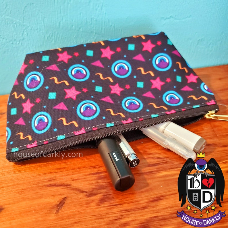 Black and neon retro eyes and abstract print zippered pouch with flat bottom