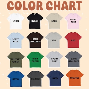 May include: Color chart showing 16 different t-shirt colors. The colors are: white, black, sand, light pink, light blue, dark chocolate, ash, red, military green, Irish green, sport gray, dark heather, royal, charcoal, navy, and orange.