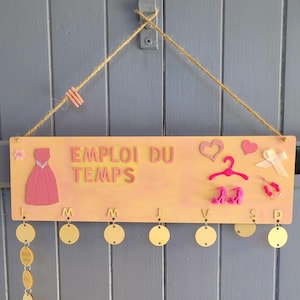 Wooden timetable for children. Can be personalized with the child&#39;s name. Useful, fun, and decorative back-to-school item.