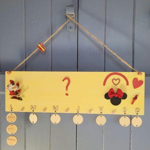 Wooden timetable for children. Can be personalized with the child&#39;s name. Useful, fun, and decorative back-to-school item.