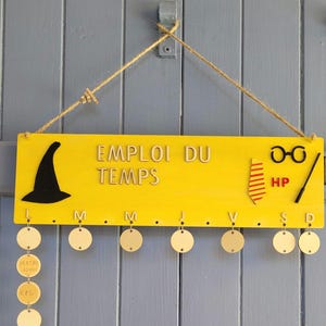 Wooden timetable for children. Can be personalized with the child&#39;s name. Useful, fun, and decorative back-to-school item.