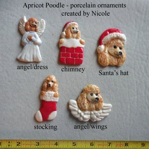May include: Apricot Poodle porcelain ornaments. Five porcelain ornaments featuring apricot poodles in various festive designs. Includes an angel, chimney, Santa's hat, stocking, and angel with wings. Text on the image reads "Apricot Poodle - porcelain ornaments created by Nicole."