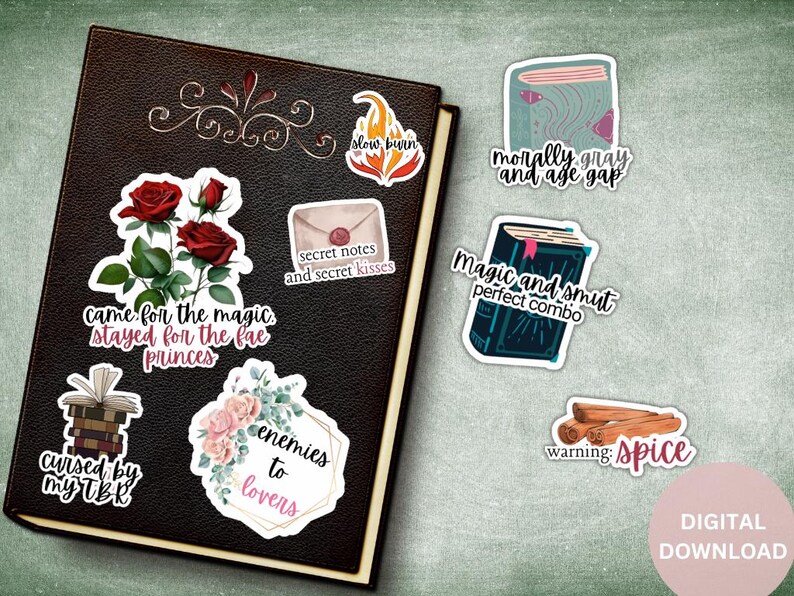 May include: A set of printable bookish stickers featuring various phrases and designs, including "came for the magic, stayed for the fae princes", "enemies to lovers", "slow burn", "secret notes and secret kisses", "morally gray and age gap", "magic and smut perfect combo", "cursed by my TBR", and "warning: spice".