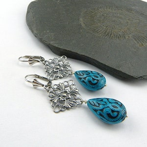 Filigree silver, bright turquoise. Long drop earrings with delicately decorated drops in turquoise blue and black. Winter jewelry. image 1