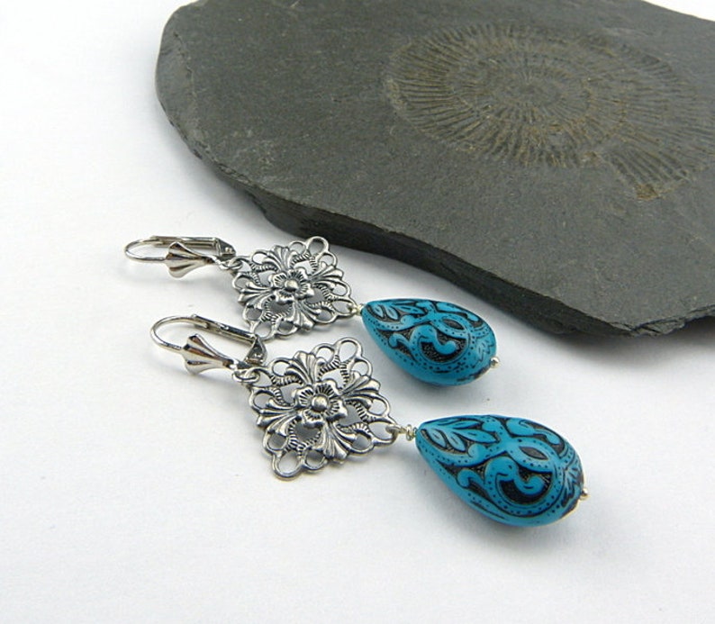 Filigree silver, bright turquoise. Long drop earrings with delicately decorated drops in turquoise blue and black. Winter jewelry. image 1