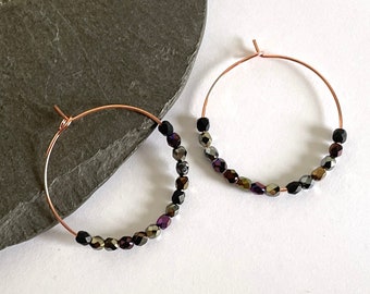 Tiny Bohemian Beads on rose golden Hoop Earrings. Oilslick colors, simple, elegant and playful.