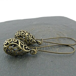 Delicate filigree drops on long ear hooks. Vintage style, romantically playful earrings, boho style, simple, nickel-free, summer jewelry. image 3