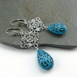 Filigree silver, bright turquoise. Long drop earrings with delicately decorated drops in turquoise blue and black. Winter jewelry. image 2