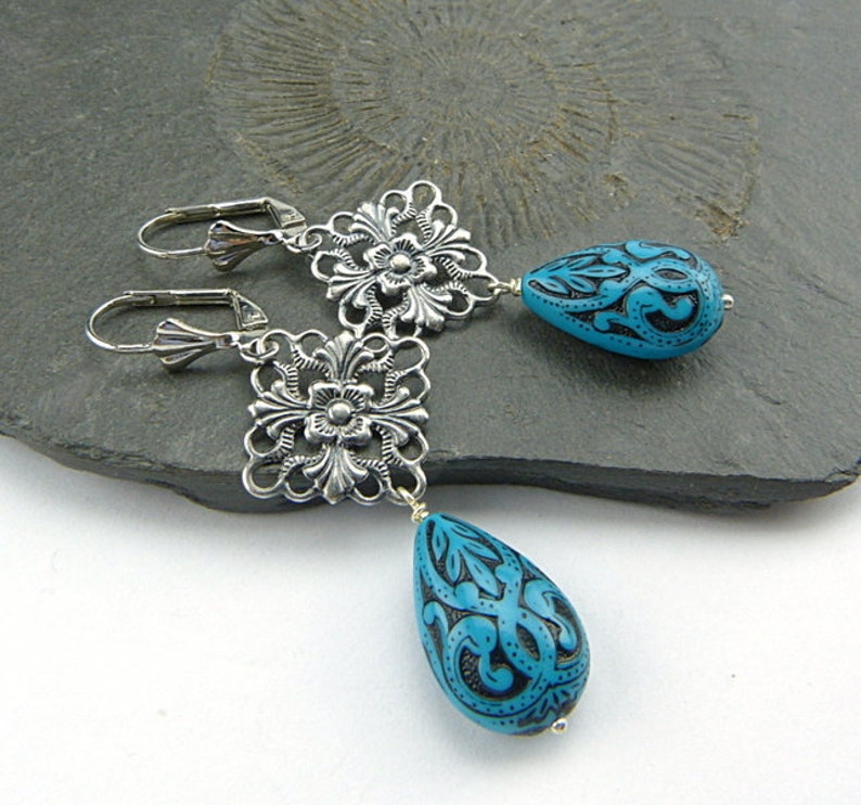 Filigree silver, bright turquoise. Long drop earrings with delicately decorated drops in turquoise blue and black. Winter jewelry. image 2