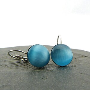 Turquoise shimmer cat's eye cabochons in a silver-plated setting. Simple minimalist earrings in bright blue. Nickel free 14mm image 2