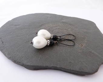 Pearl drops. Timelessly elegant earrings with white shell drops and silver. Simple, elegant and noble. Festive, timeless.