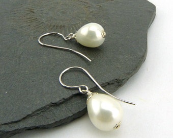 Timeless Pearls. Shimmering white shell pearl drops on curved earwires. Classic jewellery. Feminine, holiday gift Silver plated, nickel free