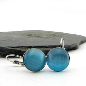 Turquoise shimmer cat's eye cabochons in a silver-plated setting. Simple minimalist earrings in bright blue. Nickel free 14mm image 1