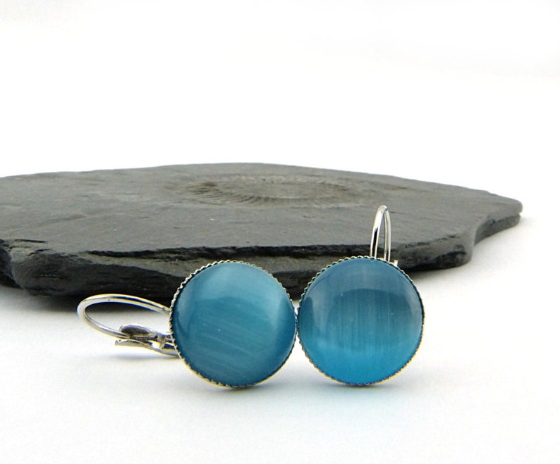 Turquoise shimmer cat's eye cabochons in a silver-plated setting. Simple minimalist earrings in bright blue. Nickel free 14mm image 1