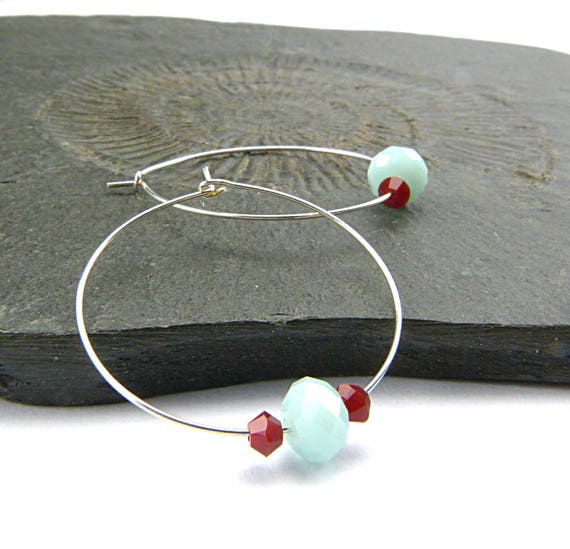 sparkly and feminine. Blue Sparkle Drops Shiny Faceted Glass Drop Earrings with silver accent and gunmetal french earwires