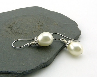 Pearl Drop Earrings. White shell pearl drops on long curved earwires. Lovely and timeless jewellery. Shimmering white pearl. Christmas Gift