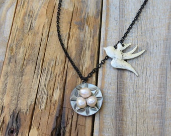 Taupe Mother of Pearl Nest with Cream Pearl Eggs and Metal Bird Charm Necklace