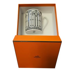 Original Hermes tea cup with box.