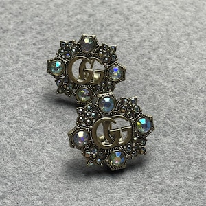 Pendientes vintage Gucci en tono dorado con piedras. Regalo vintage de los años 90 en tono dorado para ella.