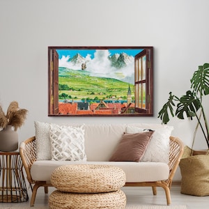 May include: A painting of a window view with a small town in the distance. The town is nestled in a valley with mountains in the background. The sky is blue with white clouds. The window is open and the curtains are drawn back. The painting is framed in a brown frame.